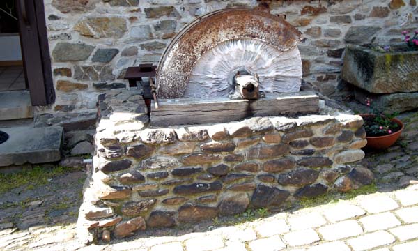 Old stone cutters wheel in Herstein