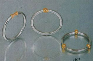 Niessing rings in white and yellow gold