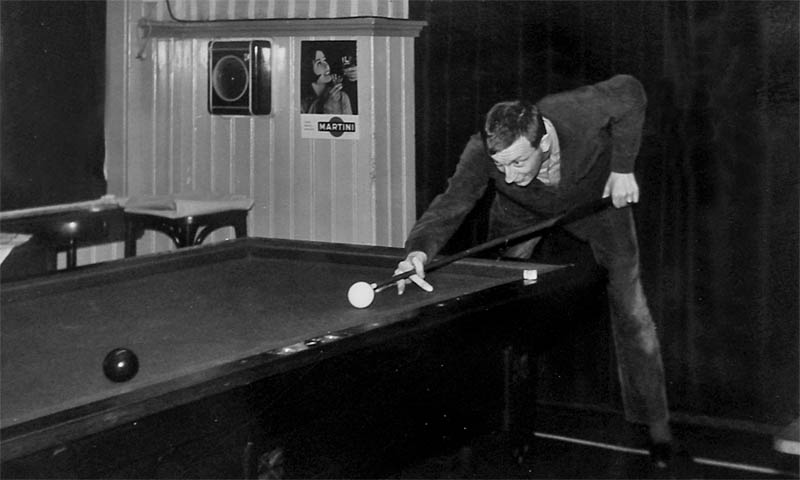 At the billiard table